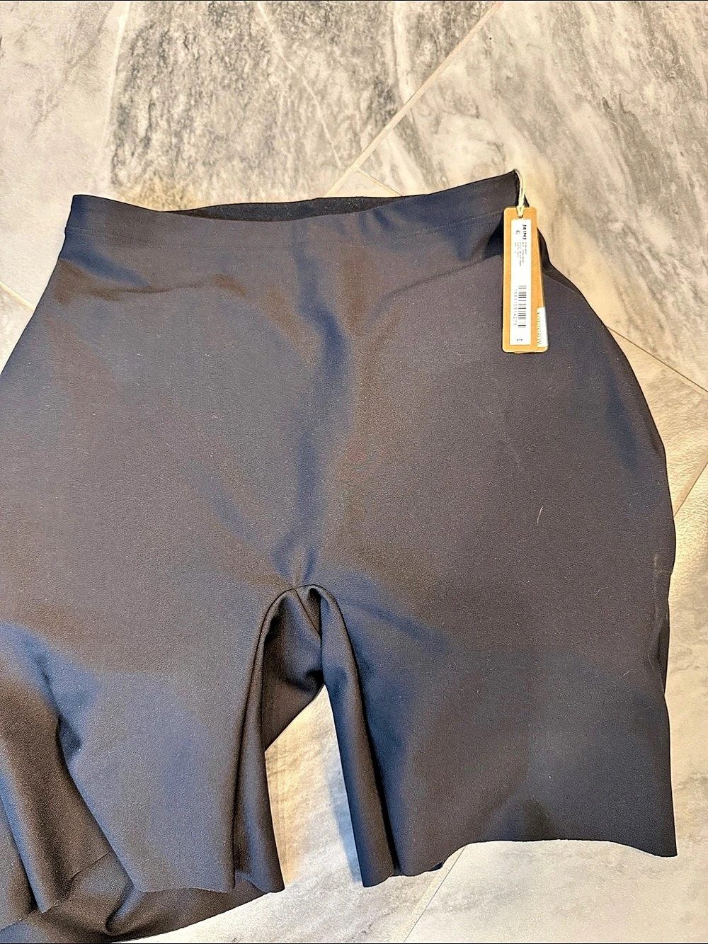 SkimsCompression Shorts with cushioned inserts for the bum in onyx Size Medium
